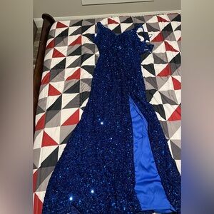 Beautiful sparkly blue formal dress with a slit in the leg